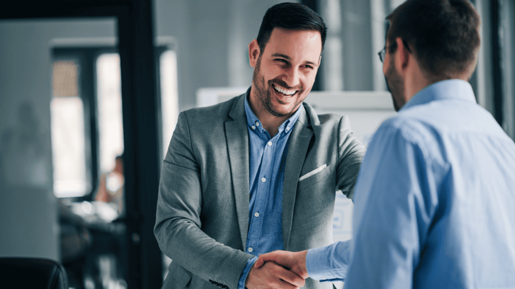 men shake hands trust financial advisors